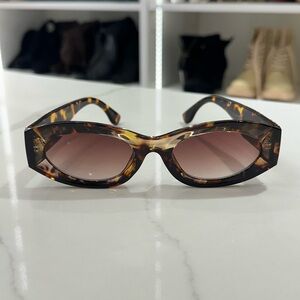 MIU MIU Brown Oval Sunglasses